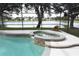 Inviting screened pool and spa with lake view at 1513 Blue Sky Way, Clermont, FL 34714