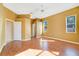 A sun-drenched bedroom featuring laminate flooring and a spacious layout with walk-in closet at 2686 Maxwell W Ct, Kissimmee, FL 34743