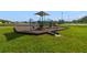 Community playground featuring a slide, climbing structure, and soft surface ground at 2686 Maxwell W Ct, Kissimmee, FL 34743