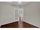 Bedroom with ceiling fan, base molding, and an open door at 6107 Metrowest Blvd # 104, Orlando, FL 32835