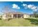 Spacious backyard with a well-maintained lawn, perfect for outdoor activities and gatherings at 1511 Alligator St, St Cloud, FL 34771