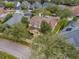 Aerial view of a two-story house nestled in a residential neighborhood at 9668 Loblolly Pine Cir, Orlando, FL 32827