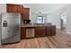 Kitchen featuring stainless steel appliances and a breakfast bar at 1147 Degraw Dr, Apopka, FL 32712