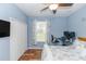 Bedroom featuring a closet, window with natural light, and study desk at 19808 Seaview St, Orlando, FL 32833