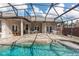 Large pool and patio with hot tub and seating area at 19808 Seaview St, Orlando, FL 32833