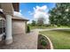 Brick paved walkway leading to a home exterior with landscaping at 19808 Seaview St, Orlando, FL 32833