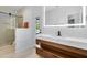 Modern bathroom with walk-in shower and quartz countertop vanity at 4024 W Danby Ct, Winter Springs, FL 32708