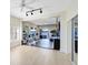 Bright home gym with mirrored walls, state-of-the-art equipment, and serene lake view at 4024 W Danby Ct, Winter Springs, FL 32708
