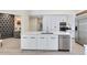 Contemporary kitchen with marble countertops, stainless steel appliances, and a wine cellar at 4024 W Danby Ct, Winter Springs, FL 32708