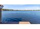 Picturesque view of the calm lake with a ladder at 4024 W Danby Ct, Winter Springs, FL 32708