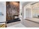 Bright living room featuring a modern fireplace and an open floor plan at 4024 W Danby Ct, Winter Springs, FL 32708