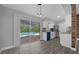 Dining area with view of pool through sliding glass doors at 5023 Golf Club Pkwy, Orlando, FL 32808