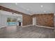 Open living room, view of kitchen and pool at 5023 Golf Club Pkwy, Orlando, FL 32808