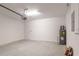 Spacious two car garage with white walls and sealed concrete floors at 8908 Sw 133Rd Ln, Ocala, FL 34473