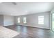 Spacious living room with multiple windows and sliders offering lots of natural light at 8908 Sw 133Rd Ln, Ocala, FL 34473