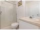 Clean bathroom with a shower/tub combo, toilet, and vanity at 8169 Fan Palm Way, Kissimmee, FL 34747