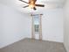 Neutral bedroom featuring a ceiling fan, carpet, and natural light at 207 Maplebrook Dr, Altamonte Springs, FL 32714