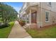 Townhome exterior showcasing architectural details and landscaping at 207 Maplebrook Dr, Altamonte Springs, FL 32714