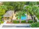 Aerial view of the community pool, sun deck, and picnic area at 207 Maplebrook Dr, Altamonte Springs, FL 32714