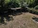 Spacious backyard featuring a covered patio area, perfect for outdoor entertaining and relaxation at 5018 Figwood Ln, Orlando, FL 32808