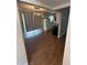 Open dining area with tile flooring and access to the kitchen at 5018 Figwood Ln, Orlando, FL 32808