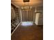 Charming dining area boasts unique wall art, modern lighting, and access to a fridge at 5018 Figwood Ln, Orlando, FL 32808
