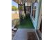 Inviting front porch enhanced with stylish metal decoration and a touch of greenery at 5018 Figwood Ln, Orlando, FL 32808