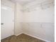 Walk-in closet with shelving and carpet at 5240 N Lake Burkett Ln, Winter Park, FL 32792