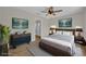 This bedroom features modern decor and furnishings with a bathroom visible through an open doorway at 1533 Loch Avich Rd, Winter Garden, FL 34787