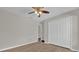 Bedroom with closet, ceiling fan and laundry room view at 1533 Loch Avich Rd, Winter Garden, FL 34787