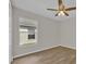 Bedroom features a standard closet and large window at 1533 Loch Avich Rd, Winter Garden, FL 34787