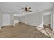 Open-concept living room featuring hardwood floors, recessed lighting, and modern ceiling fan at 1533 Loch Avich Rd, Winter Garden, FL 34787