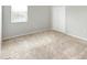 This bedroom features a double door closet and a large window at 2781 Sand Oak Loop, Apopka, FL 32712