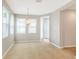 Dining room has tile floors, lots of natural light, and stylish chandelier at 2781 Sand Oak Loop, Apopka, FL 32712