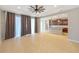 Spacious living room with tile flooring, recessed lighting, and an open flow to the kitchen at 2781 Sand Oak Loop, Apopka, FL 32712