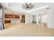 Expansive living room showcases an open layout, flowing into the kitchen and dining areas at 2781 Sand Oak Loop, Apopka, FL 32712