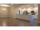 Open-concept kitchen with a large island, stainless steel appliances, and lots of cabinets at 3621 Arlington Ridge Blvd, Leesburg, FL 34748