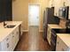 Well-equipped kitchen with stainless steel appliances, an island, and plenty of counter space at 3621 Arlington Ridge Blvd, Leesburg, FL 34748