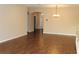 Spacious living room with tile floors and chandelier lighting at 3621 Arlington Ridge Blvd, Leesburg, FL 34748