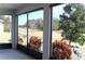 Screened-in patio with potted plants offering views of the golf course at 3621 Arlington Ridge Blvd, Leesburg, FL 34748