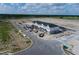 Aerial view of townhouses under construction in a new community at 1366 Twelve Oaks Rd, Saint Cloud, FL 34771