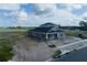 Aerial view of a single Gathering home under construction at 1366 Twelve Oaks Rd, Saint Cloud, FL 34771