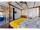 Main bedroom with four-poster bed and access to outdoor patio at 2601 Isla Vista Ct, Kissimmee, FL 34747