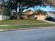 House exterior with driveway and landscaping at 267 Tinder Pl, Casselberry, FL 32707