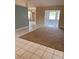 Open living area with tile and carpeted floors at 267 Tinder Pl, Casselberry, FL 32707