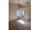 Main bedroom with carpet, ceiling fan, and en-suite bathroom at 267 Tinder Pl, Casselberry, FL 32707