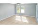 Light and airy bedroom with tile floors and ceiling fan at 3290 Cross Fox Dr, Mulberry, FL 33860