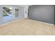 Living room with tile floors and neutral wall colors at 3290 Cross Fox Dr, Mulberry, FL 33860