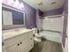 Bathroom featuring a shower-tub combo and vanity with a new countertop and backsplash at 3468 Soho St # 107, Orlando, FL 32835