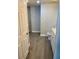 A bathroom featuring gray flooring with a shower, toilet, and a vanity with a sink at 3468 Soho St # 107, Orlando, FL 32835